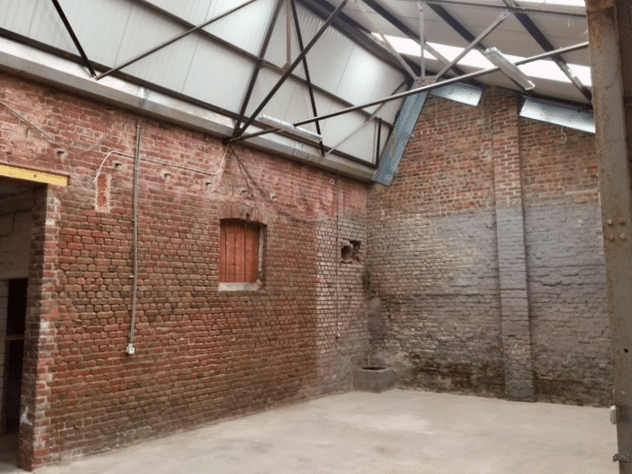Pratique entrepôt-atelier périurbain de Tournai
